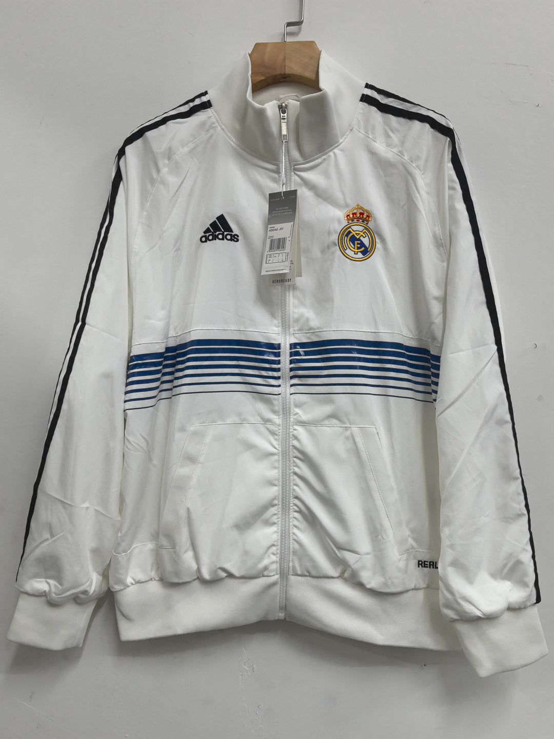 Jaqueta Corta Vento Real Madrid 2025/26 - Branca