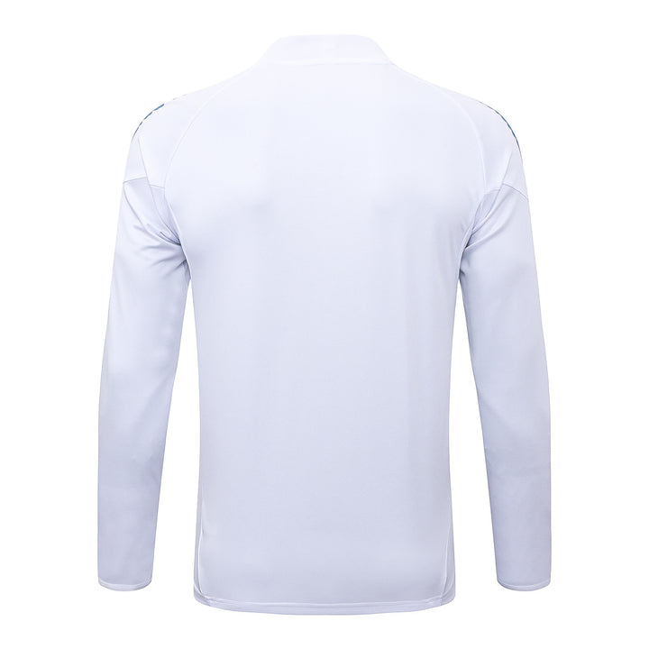 Blusão Real Madrid 2025/26 - Branco/Azul Claro