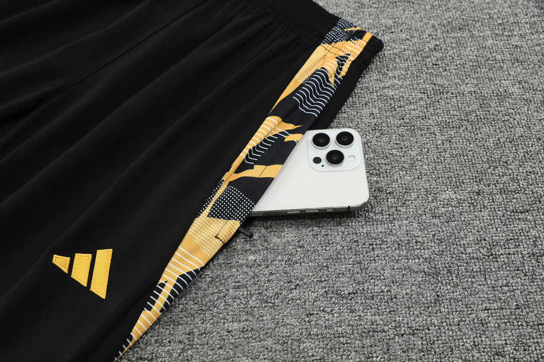 Conjunto Real Madrid 2024/25 Preto/Amarelo - Capuz
