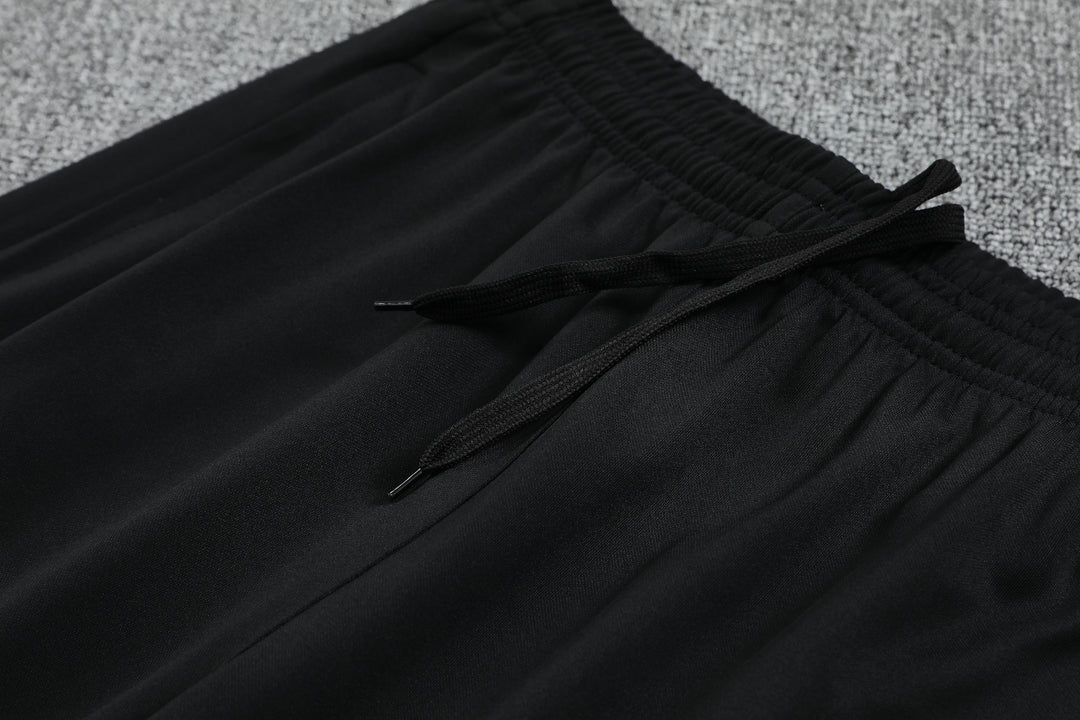Calça Manchester United 2025/26 - Preto/Vermelho