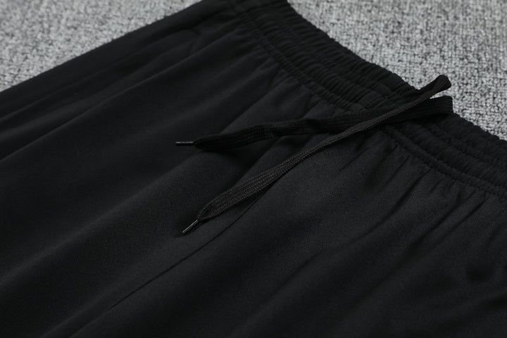 Calça Manchester United 2025/26 - Preto/Vermelho