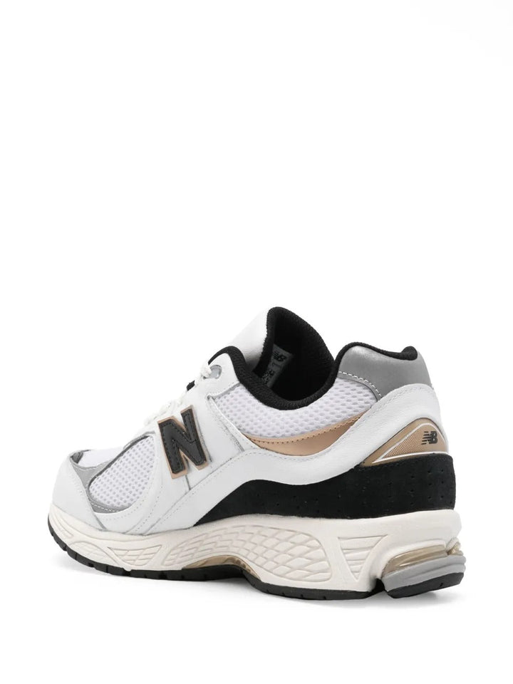 New Balance 2002R - Branco/Preto/Dourado