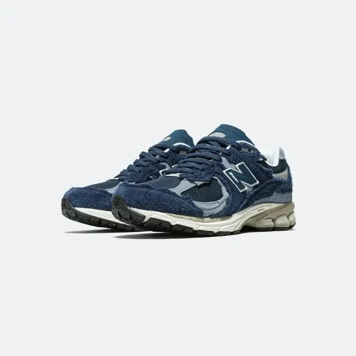 New Balance 2002R Protection Pack – Azul/Cinza