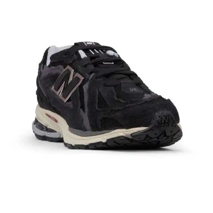 New Balance 1906D Protection Pack – Preto/Prata Metálico