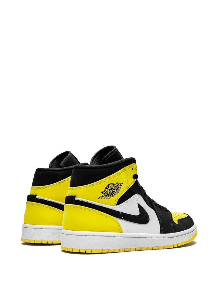 Jordan 1 Mid - Branco/Preto/Amarelo