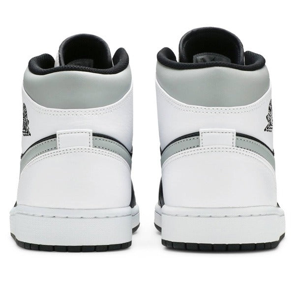 Jordan 1 Mid - Preto/Branco/Cinza