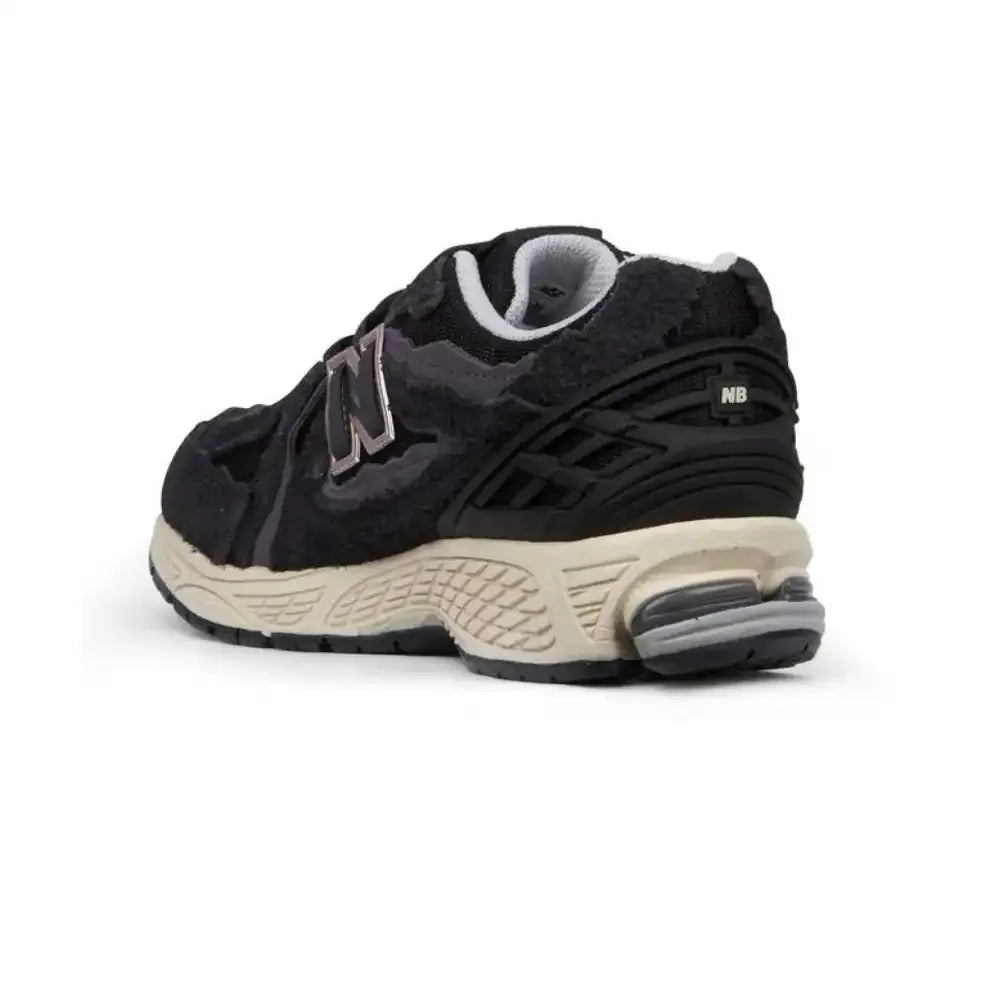 New Balance 1906D Protection Pack – Preto/Prata Metálico