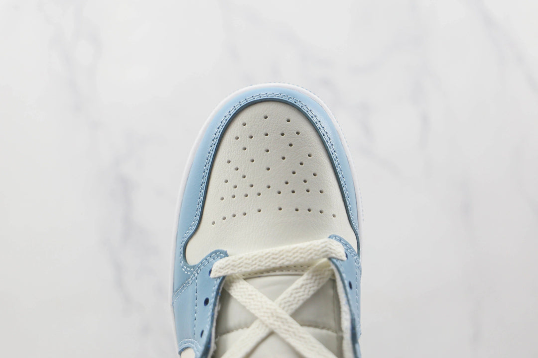 Jordan 1 Mid UNC - Branco/Azul University