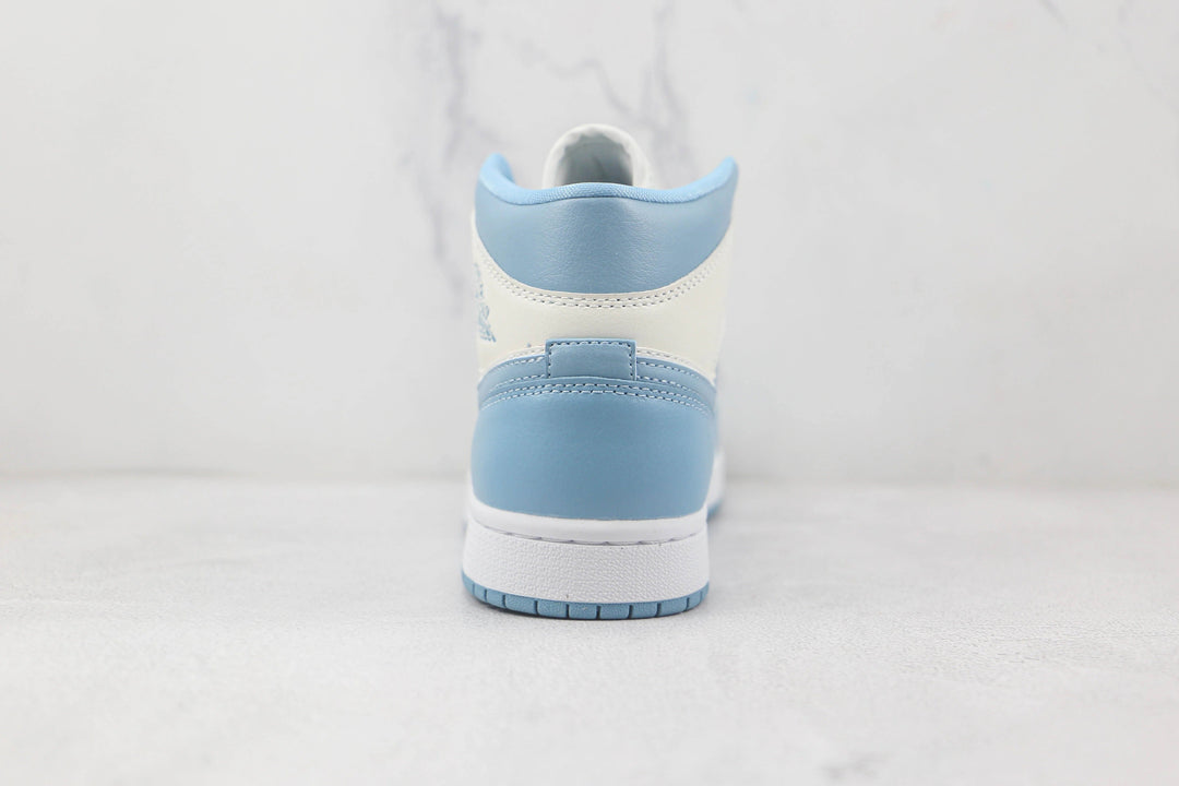 Jordan 1 Mid UNC - Branco/Azul University
